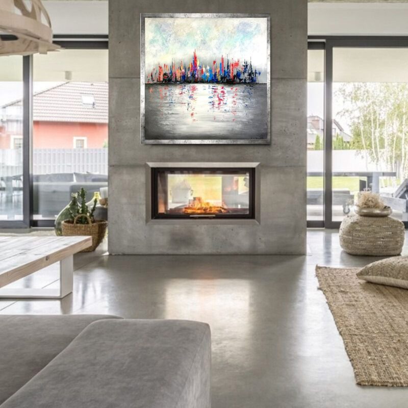 obraz kolorowe miasto w ramie nad kominkiem